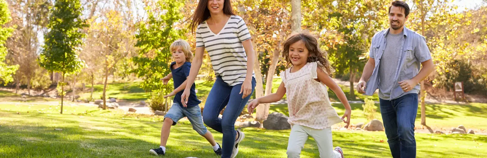 family playing soccer