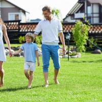 family walking on lawn